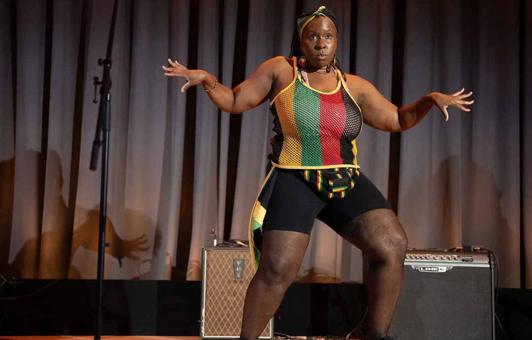 Dancehall dancer Shelaine Prince onstage at WritersMosaic's Blood & Fire: Passion and Lyricism event at the British Library, September 2023.