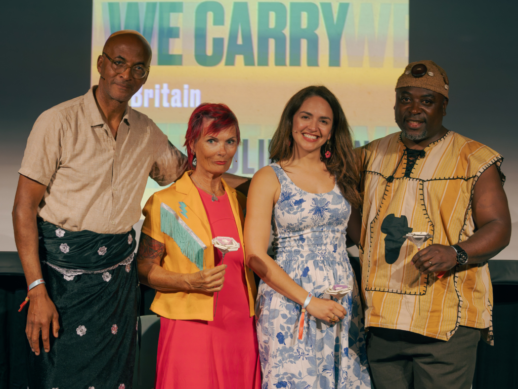 What We Leave We Carry panellists (l-r) Colin Grant, Suzanne Harrington, Amanda Vilanova and Eric Ngalle Charles at Hay Festival 2026. © Finn Beales.