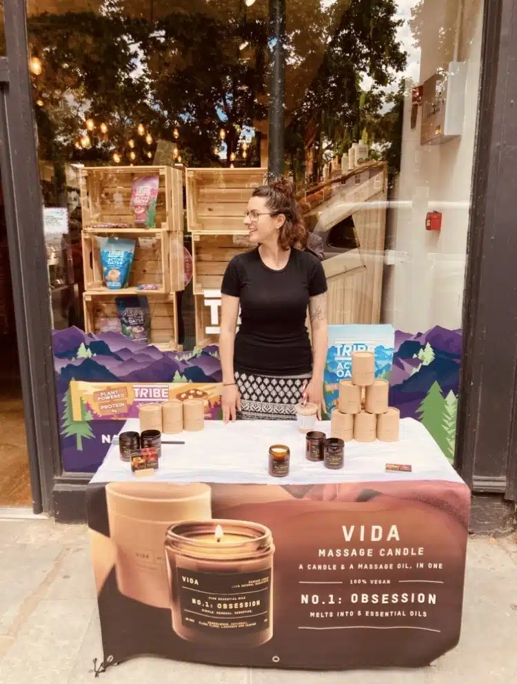 Sameera pictured during one of her other jobs – selling her own homemade candles.